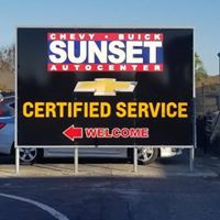 Sunset Auto Center logo
